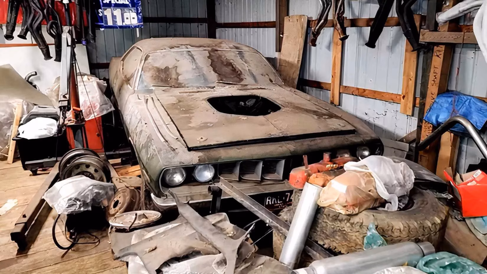 i-watched-a-1971-plymouth-cuda-emerge-from-a-30-year-garage-slumber-and-it-hit-me-like-a-wave-of-high-octane-nostalgia-image-0